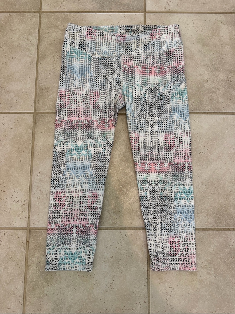 Fabletics White Capri Leggings with Pink, Teal and Black Geo Print